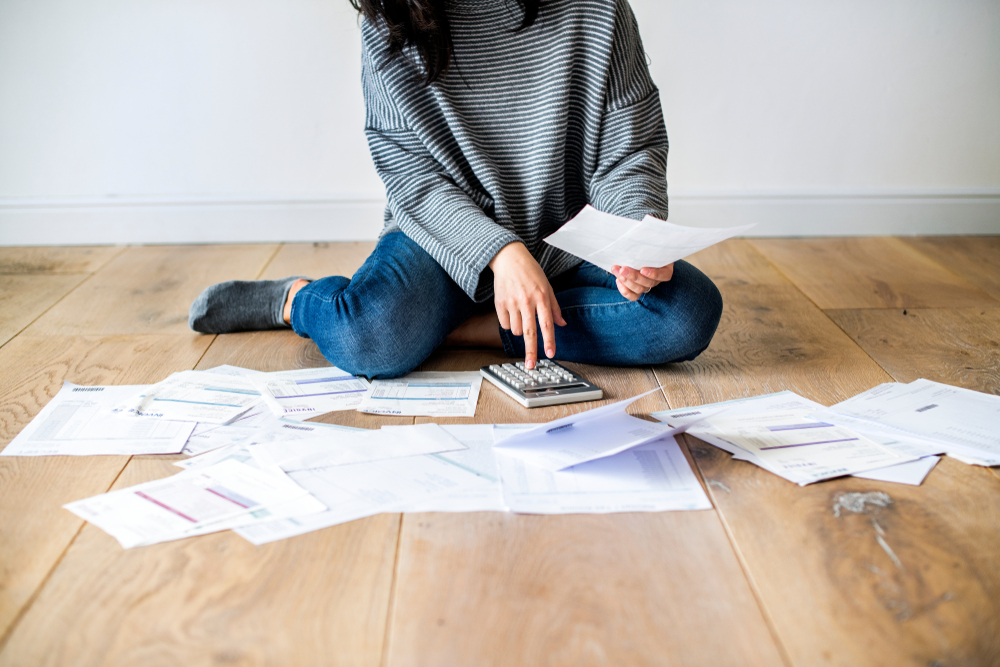 Woman managing debt, learning how to apply for an iva